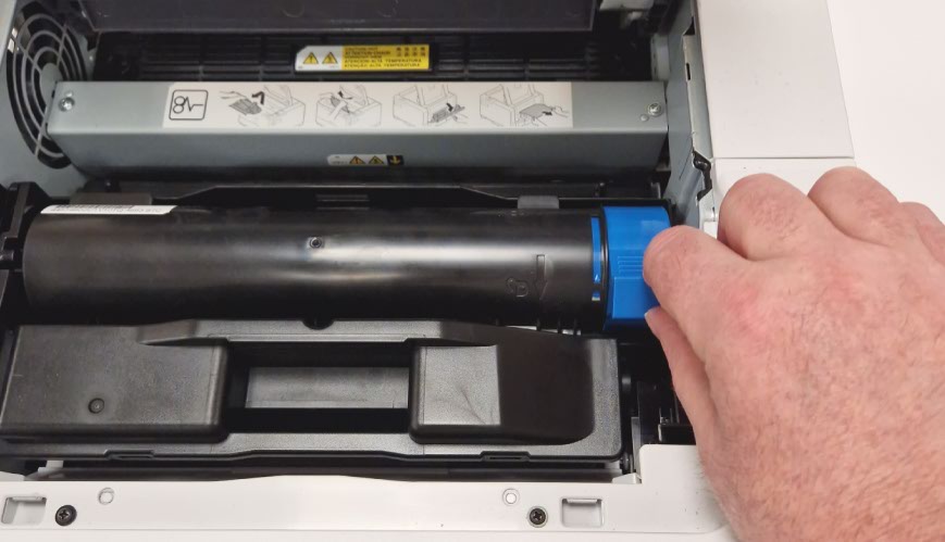 Unlock and Remove the Used Toner Cartridge